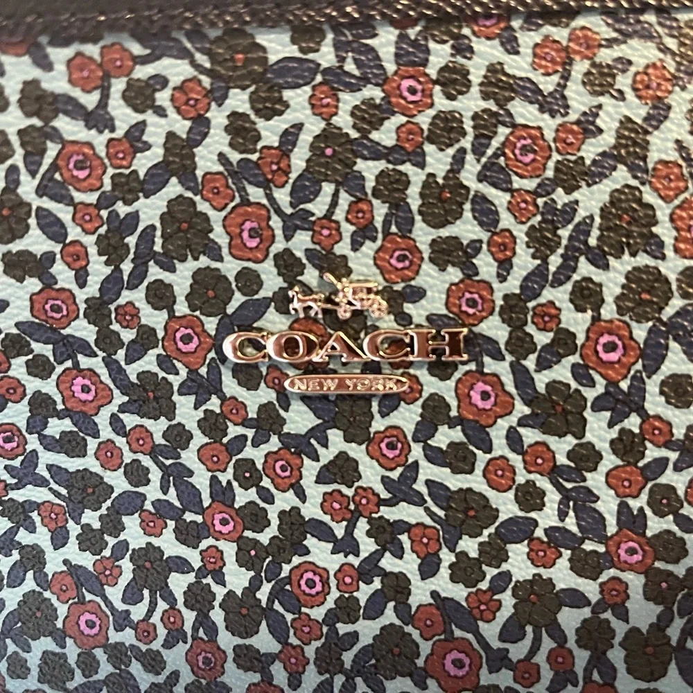 Coach EUC Reversible Navy & flower Tote with Structured Design and Gold Accents - Picture 10 of 14